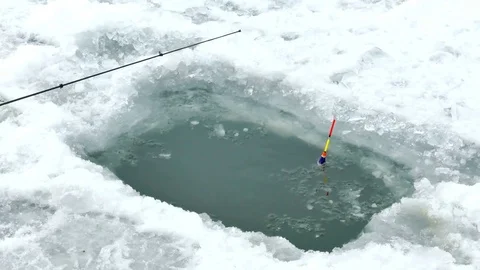 Fishing on the Frozen River Stock-Footage 72171383