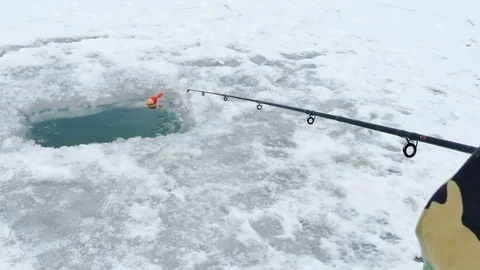 Fishing on the Frozen River Stock-Footage 72171459