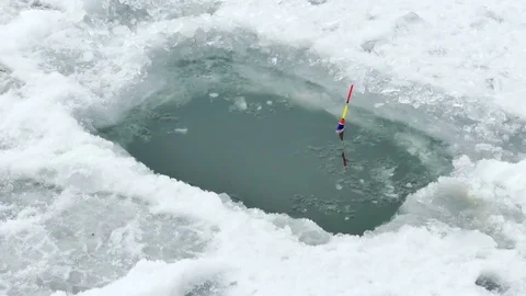 Fishing on the Frozen River Stock-Footage 72171476
