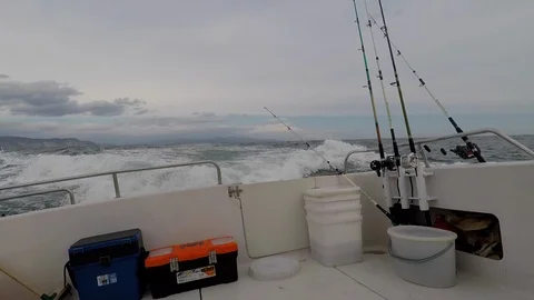 Fishing gear on the stern of a boat going through a stormy sea. Stock Footage 107272500