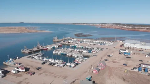 Fishing harbor at Île de la Grande Entrée in Magdalen Islands, homard's boats Stock Footage 129229986