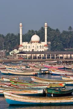 Fishing harbour with mosque in the background 写真素材