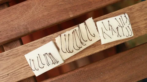 Fishing hooks of different sizes Stock Footage 160283457