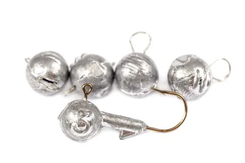 Fishing hooks with sinker on white background. Stock Photos
