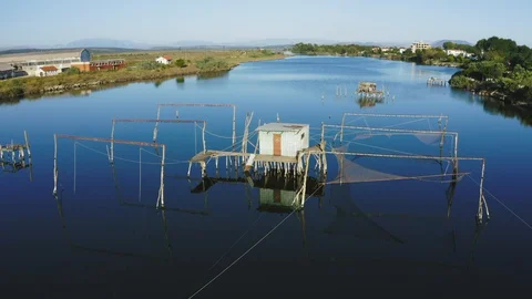 Fishing hut in river Stock Footage 128859194