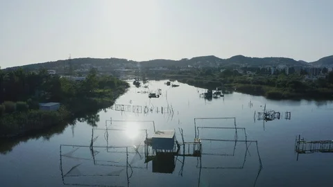 Fishing Hut in River Stock Footage 128860398