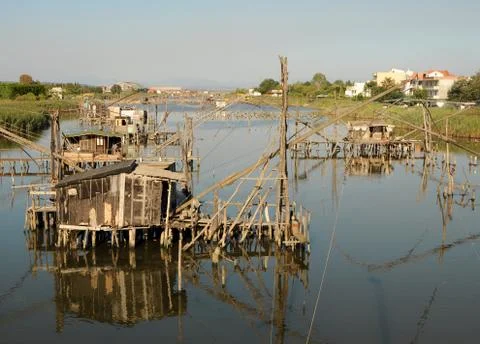 Fishing huts on the river Stock Photos
