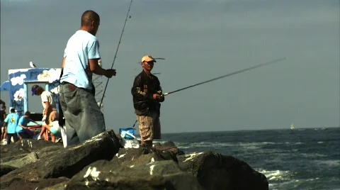 FISHING OFF JETTY Stock Footage 789301