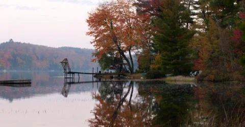 Fishing on lake in fall Stock Photos