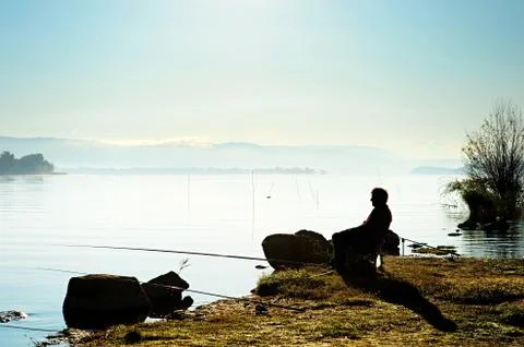 Fishing on the lake Stock Photos