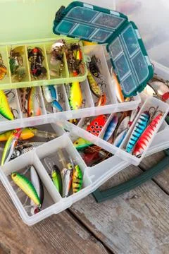 Fishing lures and baits in boxes Foto stock