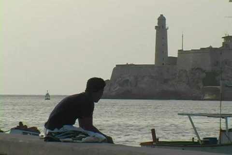 Fishing at malecon in front of morro Stock Footage 396970