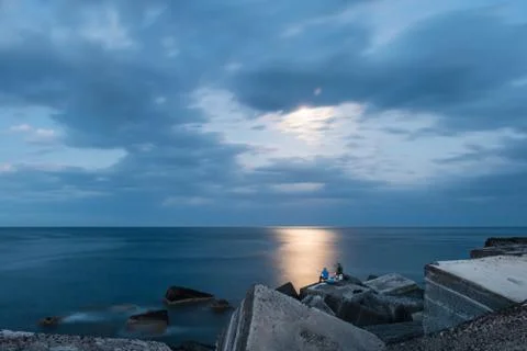 Fishing in the moonlight Stock Photos