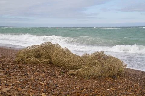 Fishing net on beach Stock Photos