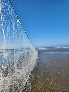Fishing Net on the Beach Stock Photos