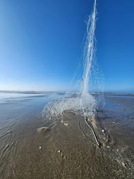 Fishing Net on the Beach Stock Photos