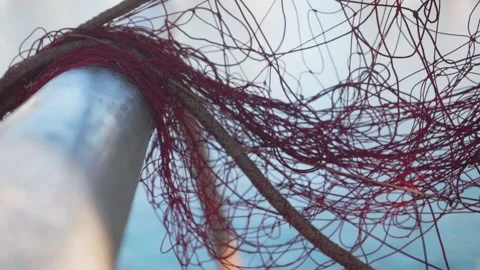 Fishing net close up, harbour workers at work Stock Footage 137864851