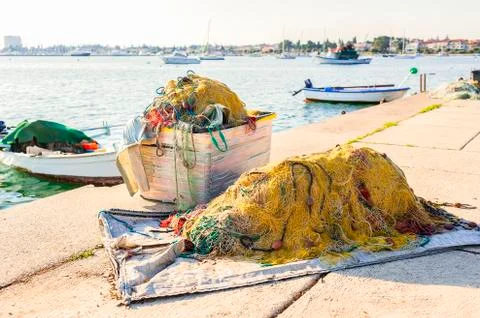 Fishing net on dock Stock Photos