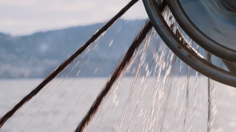 Fishing net pulled into boat by wheel Stock Footage 128699083