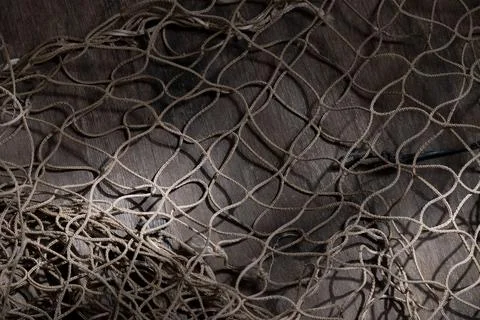 Fishing net on rustic old wood, fishing concept, art craft themes Stock Photos