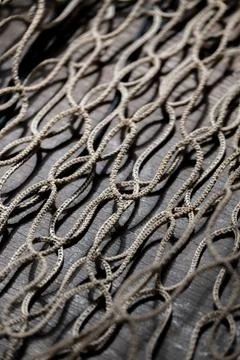 Fishing net on rustic old wood, fishing concept, art craft themes Stock Photos