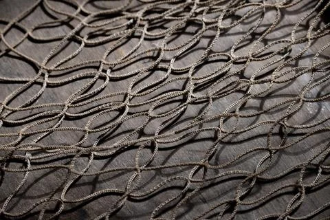 Fishing net on rustic old wood, fishing concept, art craft themes Stock Photos