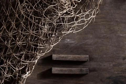 Fishing net on rustic old wood, fishing concept, art craft themes Stock Photos