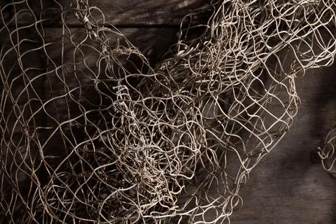Fishing net on rustic old wood, fishing concept, art craft themes Stock Photos