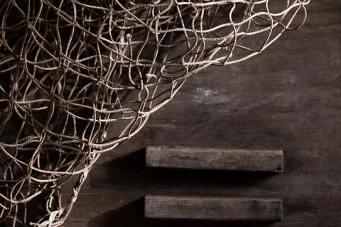 Fishing net on rustic old wood, fishing concept, art craft themes Stock Photos