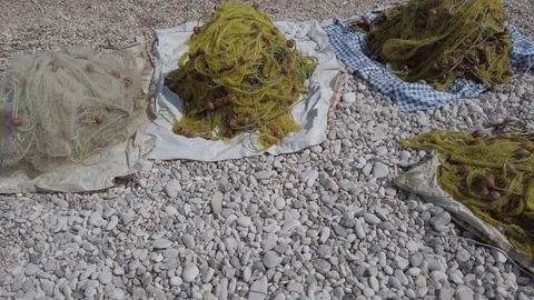 Fishing net on a sandy beach are in the bay and ready to fish Stock Footage 124009195