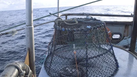 Fishing net on ship falling into sea in slow motion, United States Stock Footage 138892372