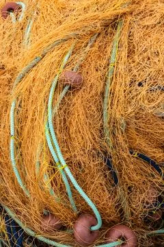Fishing net texture as background. Detailed pattern, marine material, coastal Stock Photos