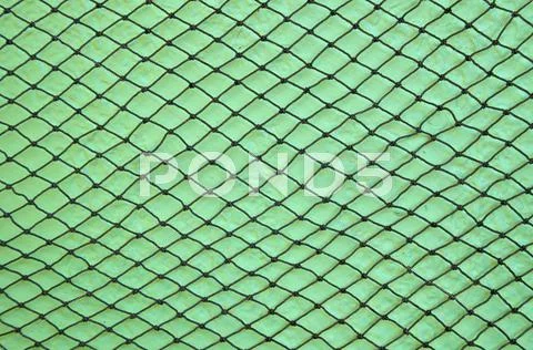 Fishing net on wall Stock Photos
