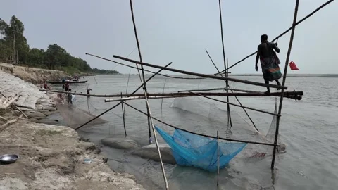 Fishing net which functions on the principle of balance, Shivalaya, Bangladesh Video stock 311339082