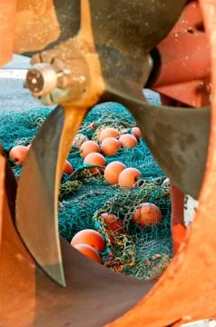 Fishing nets and propeller Stock Photos