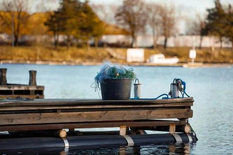 Fishing nets in the bucket. Stock Illustration