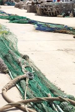 Fishing nets extended in the port Stock Photos