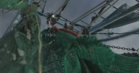 Fishing nets hanging from boat rigging Stock Footage 76679398