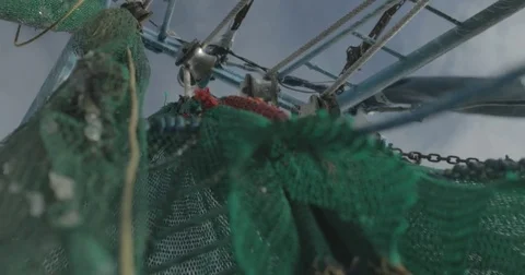 Fishing nets hanging from boat rigging Stock Footage 76679421
