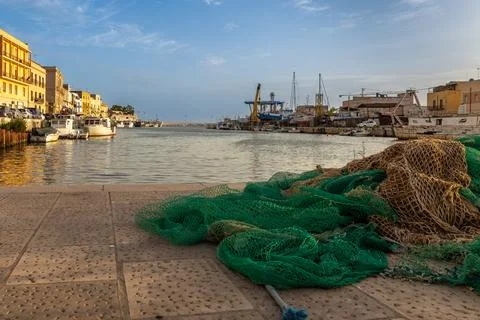 Fishing nets on the pier Stock Photos