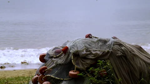 Fishing nets piled up in a pile in the Caribbean Sea on the island of Tobago. Stock Footage 288208822