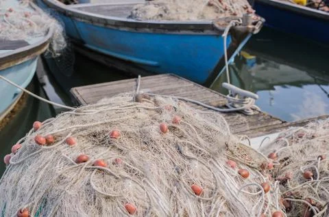 Fishing nets on the quay Stock Photos