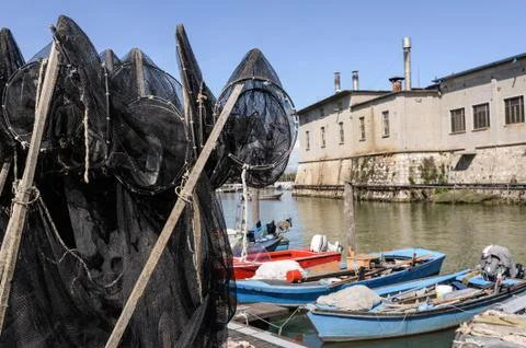 Fishing nets on the quay Stock Photos