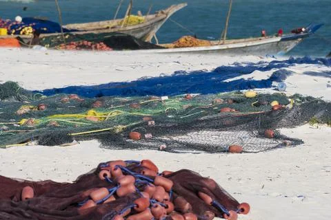 Fishing nets on sandy beach Photos