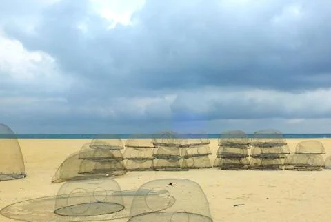 Fishing nets by the shore Stock Photos