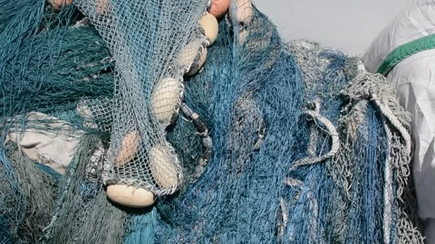 Fishing nets stacked in a box on the shore Stock-Footage 280791906