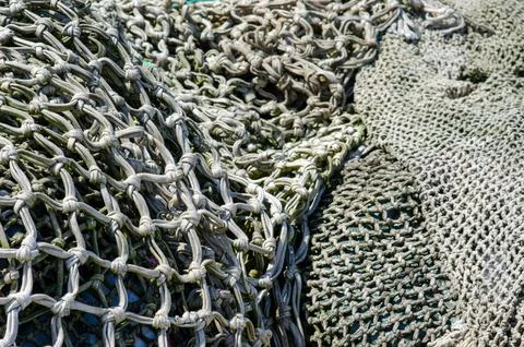Fishing Nets Texture Close-Up with Knots and Patterns Background Outdoors Stock Photos