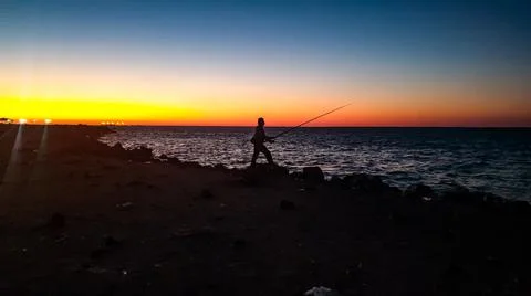 Fishing at night Stock Photos