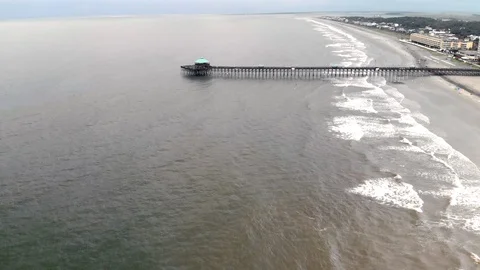 Fishing Pier Drone View Flyover Establishing Shot Stock Footage 94522699