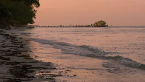Fishing Pier During Pink Sunset, 4K Stock Footage 70776252